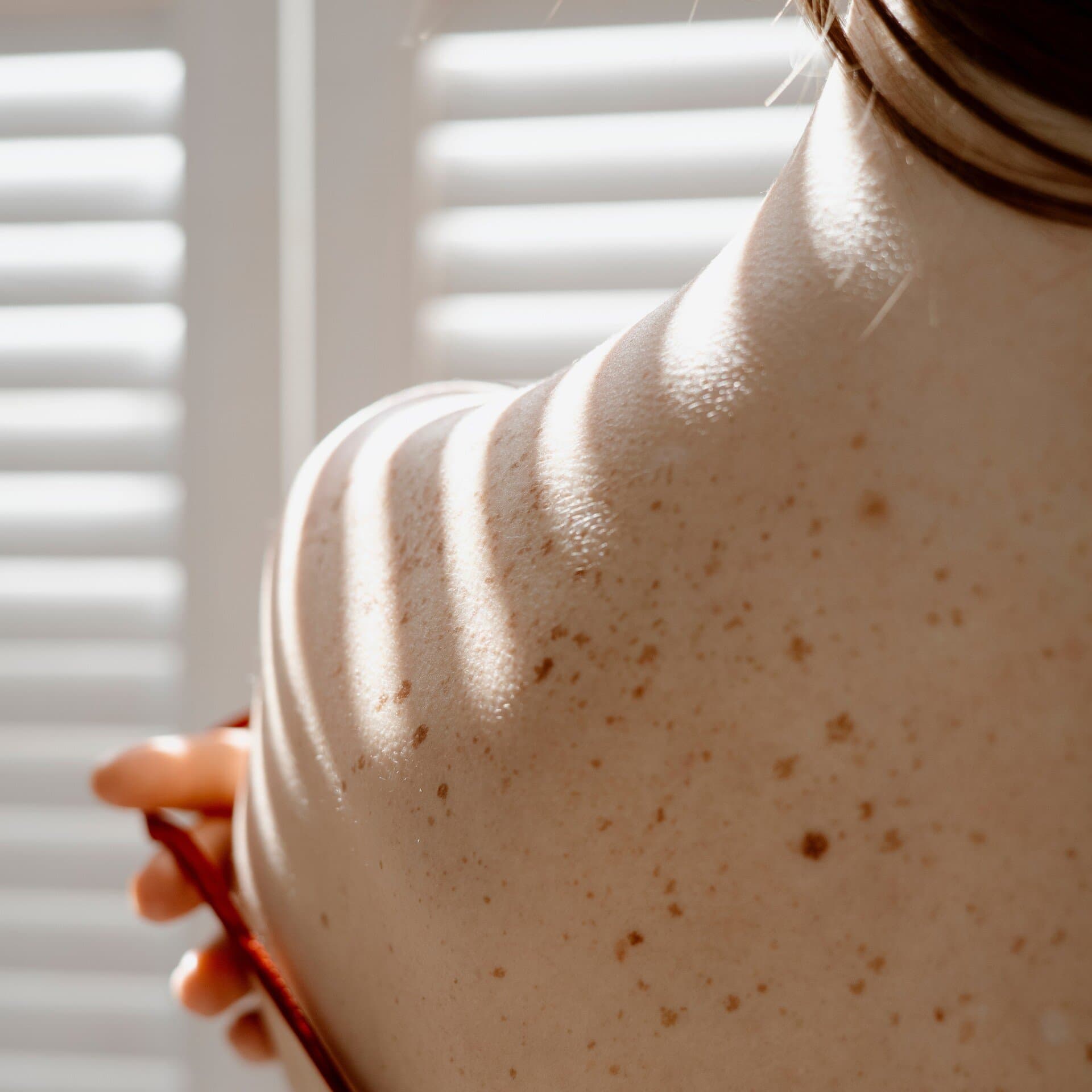 Kvinnas nacke och rygg Kvinnas nacke och rygg